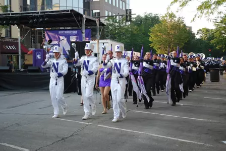 The Northwestern University Marching Band and Evanston Township High School Marching Band played for fans at the 'Kits and 'Cats Kick-Off in downtown Evanston.