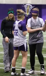 Kelly Amonte Hiller (left) works with Kelly Rich and Nancy Dunbar to fine-tune the Northwestern attack.