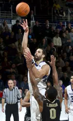 Drew Crawford hit some clutch shots in double overtime to help the Wildcats to the win.