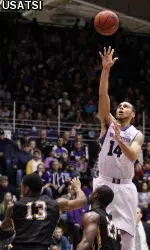 Tre Demps (14) shoots over Northern Kentucky Norse guard Todd Johnson (23) and forward Daniel Camps.