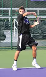 Freshman Alp Horoz won both his doubles and singles matches with ease.