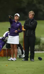 Suchaya Tangkamolprasert and Northwestern head coach Emily Fletcher