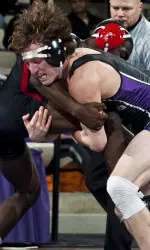 2013 NU grad Jason Welch recorded three tech falls to finish at No. 6 at the 2014 Las Vegas/ASICS Open