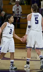 NU had a young squad in 2013-14 that started three freshmen, a sophomore and a junior. Here, freshman Ashley Deary and junior Alex Cohen helped lead NU to a 63-59 win over No. 18 Nebraska, one of three victories over top-25 squads.