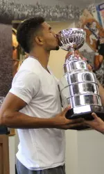 Sanjay Lumpkin claimed the 2014 Swolly Grail award Friday.