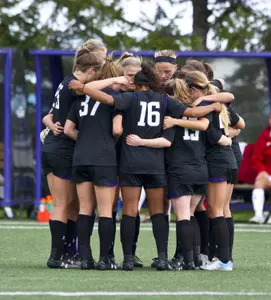 Photo by Stephen J. Carrera team pregame huddle