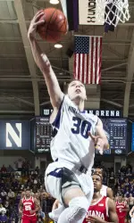 Bryant McIntosh set the Northwestern freshman assists record against Indiana on Wednesday.