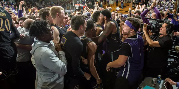 Men's basketball win over Michigan