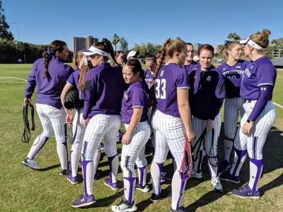 Northwestern softball team huddle