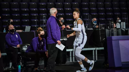 Lindsey Pulliam fist bumps Joe McKeown vs. Minnesota