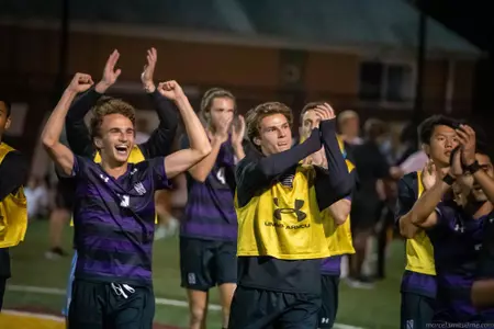 Eric Smits celebrates after Loyola win