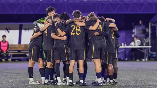Men's Soccer Team Huddle