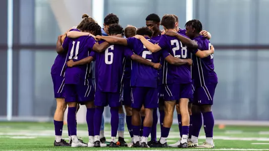 Men's Soccer Team Huddle