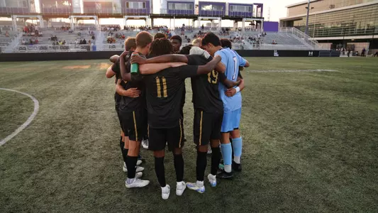 Men's Soccer Team Huddle