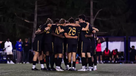 Men's Soccer Team Huddle