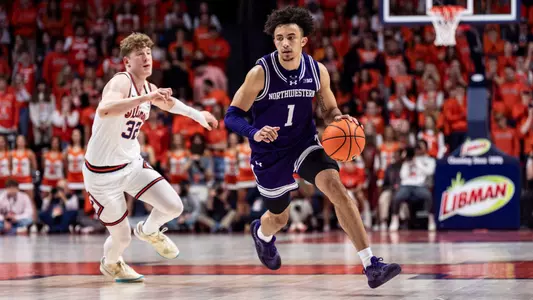 Northwestern guard Jalen Leach dribbles down the lane in a game at Illinois in Champaign on January 26, 2025.
