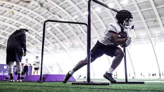 March 6, 2025, Evanston, IL: Members of the Northwestern Football team practice at Wilson Field at Ryan Fieldhouse in Evanston, IL on Thursday, March 6, 2025. (Photo by Griffin Quinn/Northwestern Athletics)