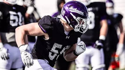 April 3, 2025, Evanston, IL: Members of the Northwestern Football team practice at Northwestern Medicine Field at Martin Stadium in Evanston, IL on Thursday, April 3, 2025. (Photo by Griffin Quinn/Northwestern Athletics)