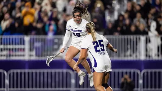 LAX_action_Michigan