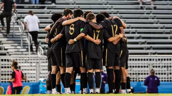 Men's Soccer Team Huddle