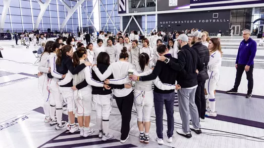 Fencing Team Huddle
