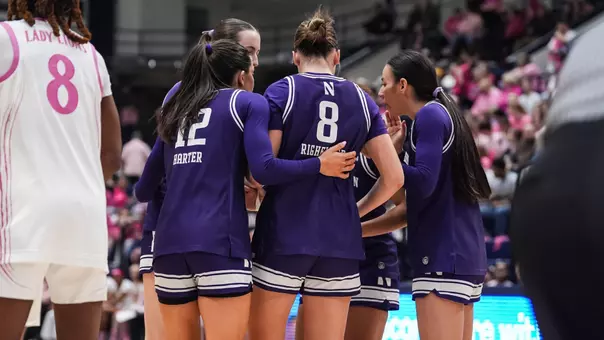 Women's Basketball Team Huddle