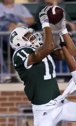 `Cats Tame Mustangs in Peden Image