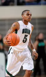 Career Day by Cooper Helps Lead `Cats Past Huskies Image
