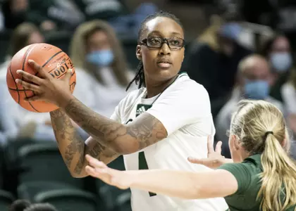 Erica Johnson passes the ball