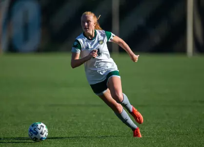 Ohio soccer player looks downfield