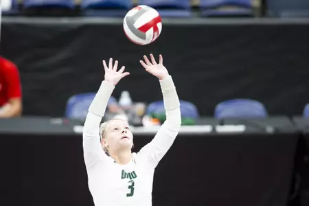 Tria McLean sets the ball.