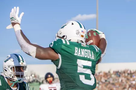 Sieh Bangura celebrating a Homecoming touchdown | Oct. 18, 2025