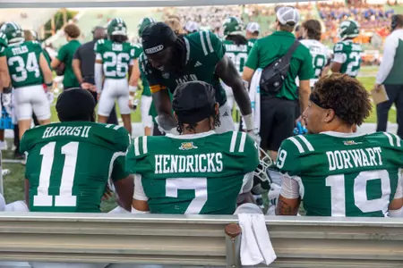 Sieh Bangura, Rodney Harris II, Chase Hendricks and Dom Dorwart on the sideline against Gardner-Webb | Sept. 20, 2025