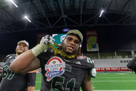 Davion Weatherspoon celebrating 2025 Scooter's Coffee Frisco Bowl victory