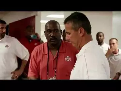 Urban Meyer presented with his first game-ball at Ohio State