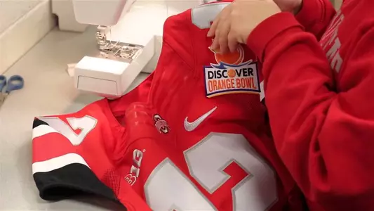 Check Out These Threads … Bucks add Orange Bowl patch to Scarlet Jersey