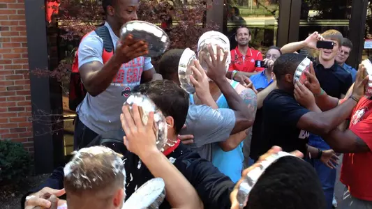 Joshua Perry leads Buckeyes in taking “Whipping Childhood Cancer” pie-in-the-face challeng