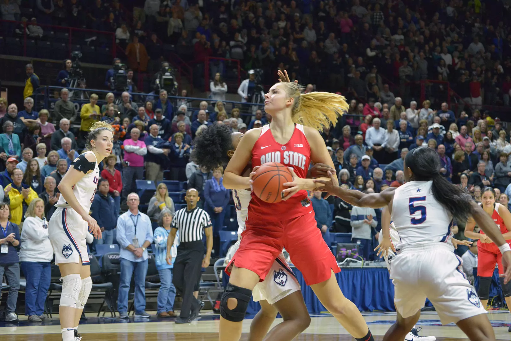 Santoro Scores 20 as Buckeyes Fall at No. 2 UConn