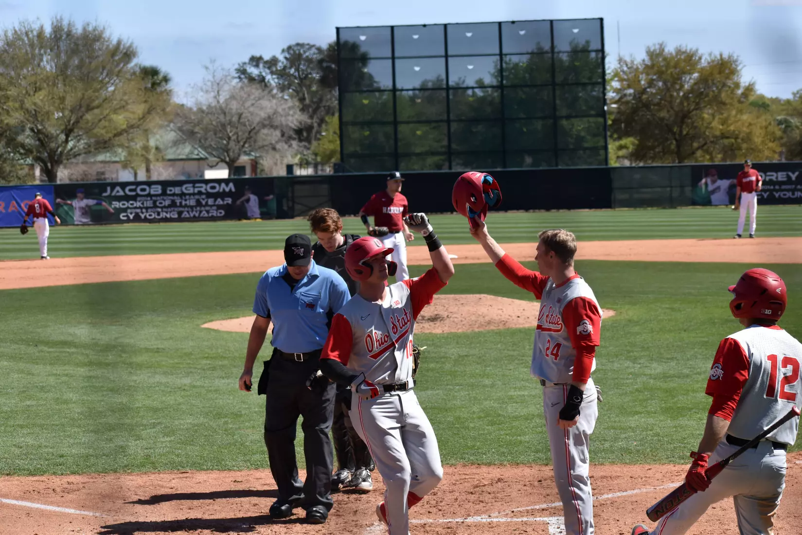 Burhenn Cruises, Buckeye Bats Break Out in 13-1 Win over Harvard