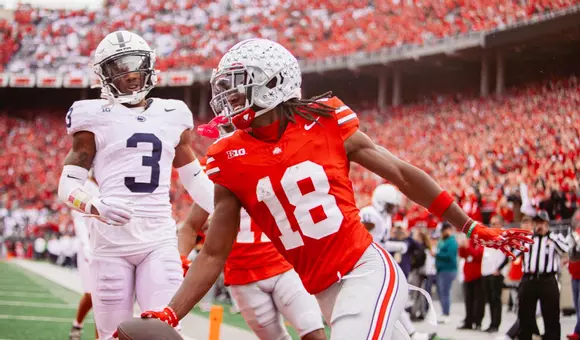 Ohio State Buckeyes wide receiver Marvin Harrison Jr. (18) considers passing on draft and playing another season at Ohio State.
