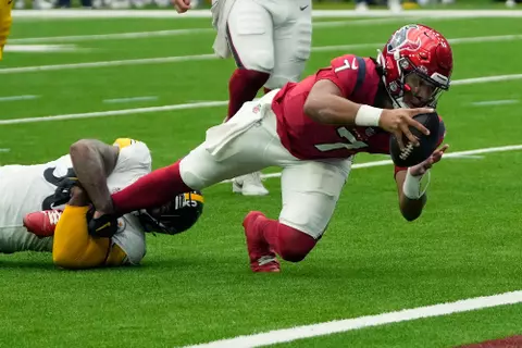 Pittsburgh Steelers linebacker Elandon Roberts, left, stops Houston Texans quarterback C.J. Stroud (7) short of the goal line during the first half of an NFL football game Sunday, Oct. 1, 2023, in Houston. (AP Photo/David J. Phillip)