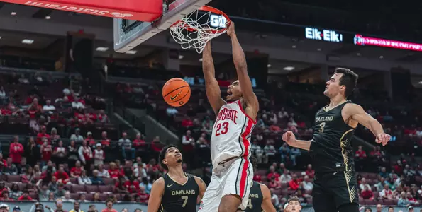Zed Key dunks in the win over Oakland on 11-6-23