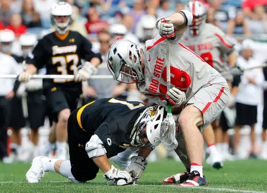 May 27, 2017; Foxborough, MA, USA; Towson Tigers midfielder Connor Harryman (7) tries to keep the ball from Ohio State Buckeyes midfielder Jake Withers (18) during the second half of the Buckeyes 12-11 win over Towson at Gillette Stadium. Mandatory Credit: Winslow Townson-USA TODAY Sports
