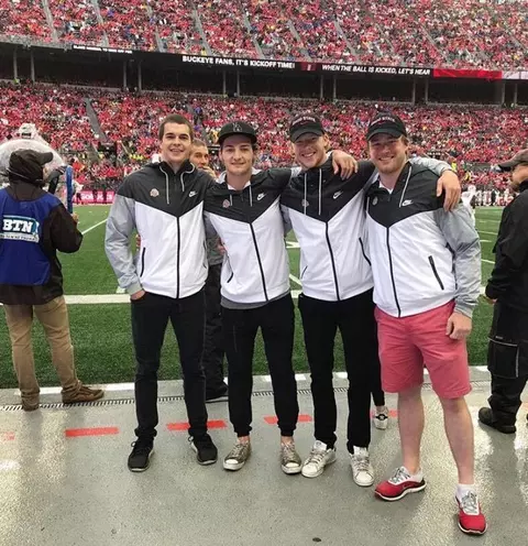 smiling at football game