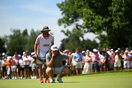 Neal Shipley and his caddie Carter Pitcairn line up their putt on hole 26 during the final match of the 2023 U.S. Amateur at Cherry Hills C.C. in Cherry Hills Village, Colo. on Sunday, Aug. 20, 2023. (Kathryn Riley/USGA)