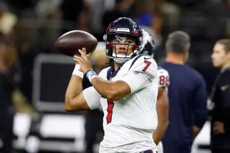 Houston Texans quarterback C.J. Stroud warms up before a preseason NFL football game against the New Orleans Saints, Sunday, Aug. 27, 2023, in New Orleans. (AP Photo/Butch Dill)