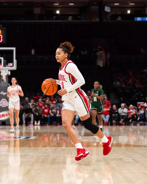 Womens basketball player with ball