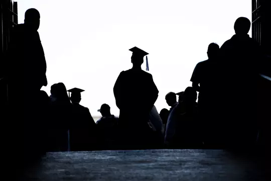 Spring commencement, graduates pose for photos at the top of the ramp entrance to Ohio Stadium.Ohio StadiumMay_5_2019Logan WallaceThe Ohio State University