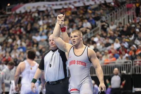 KANSAS CITY, MISSOURI - MARCH 23: Nick Feldman of the Ohio State University Buckeyes wins his match against Cohlton Schultz of the Arizona State University Sun Devils in the 285-pound class during the Division I Men's Wrestling Championship held at T-Mobile Center on March 21, 2024 in Kansas City, Missouri. (Photo by Evert Nelson/NCAA Photos via Getty Images)