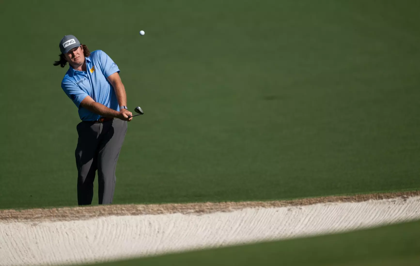 Amateur Neal Shipley of the United States chips to the No. 2 green during the final round of the 2024 Masters Tournament at Augusta National Golf Club, Sunday, April 14, 2024.